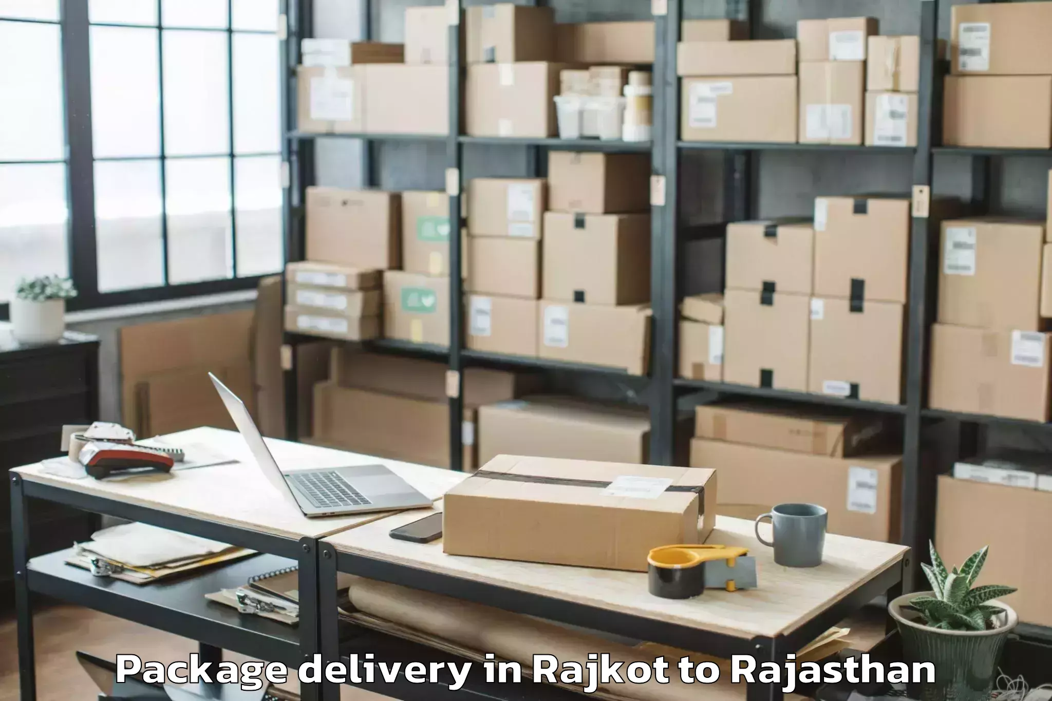 Efficient Rajkot to Abhilashi University Udaipur Package Delivery